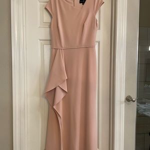 This is a Betsy & Adam size 12 light pink floor length gown.